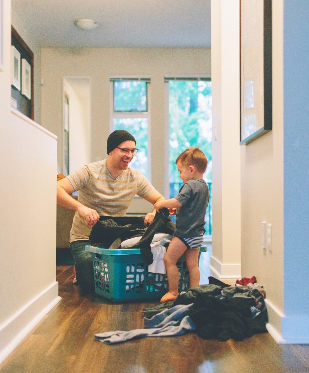 Father helping young child with daily routine at home for ADHD support and structure. ADHD naturopathic treatment for children